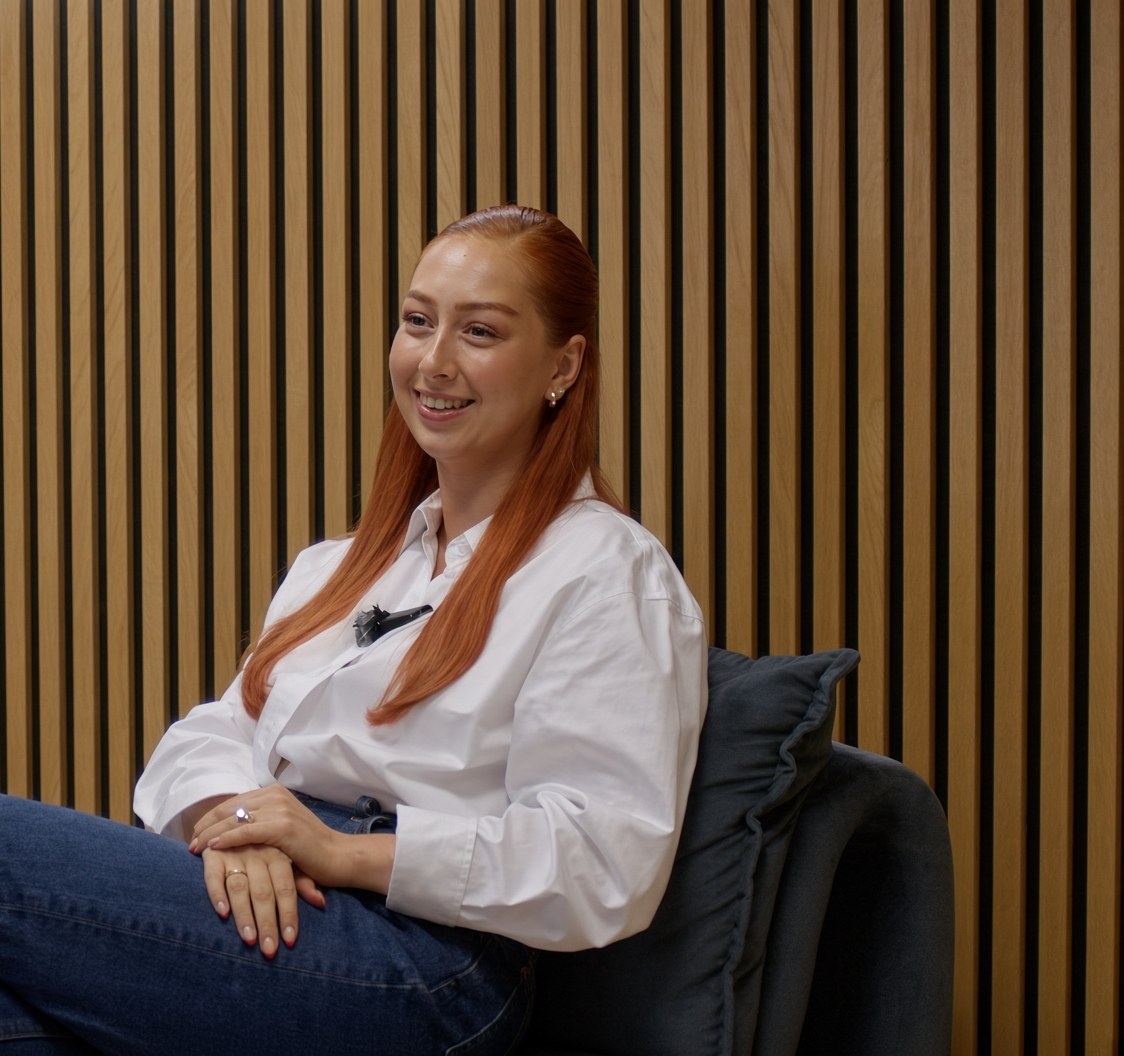 Billie from the Seer team smiling during a conversation